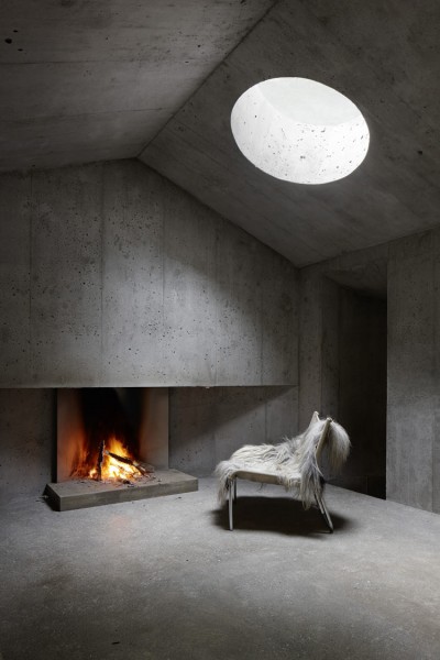 Concrete Log Cabin in the Swiss Alps by Nickisch Sano Walder Architekten