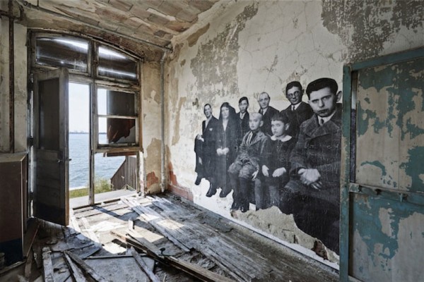 UNFRAMED Photo Exhibition in the abandoned Ellis Island Hospital by street artist JR