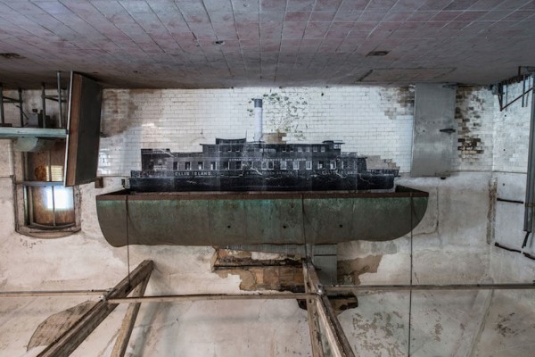 UNFRAMED Photo Exhibition in the abandoned Ellis Island Hospital by street artist JR 10