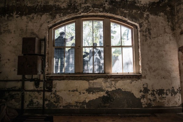 UNFRAMED Photo Exhibition in the abandoned Ellis Island Hospital by street artist JR 12