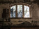 UNFRAMED Photo Exhibition in the abandoned Ellis Island Hospital by street artist JR 12