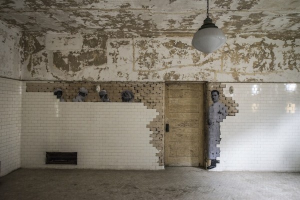 UNFRAMED Photo Exhibition in the abandoned Ellis Island Hospital by street artist JR 16