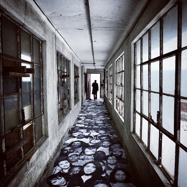 UNFRAMED Photo Exhibition in the abandoned Ellis Island Hospital by street artist JR 21