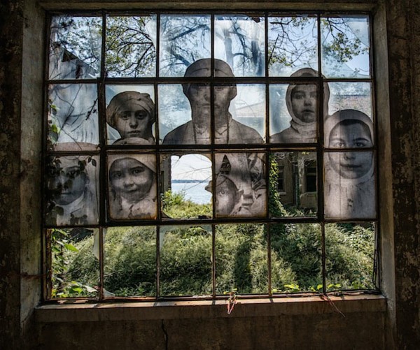 UNFRAMED Photo Exhibition in the abandoned Ellis Island Hospital by street artist JR 3