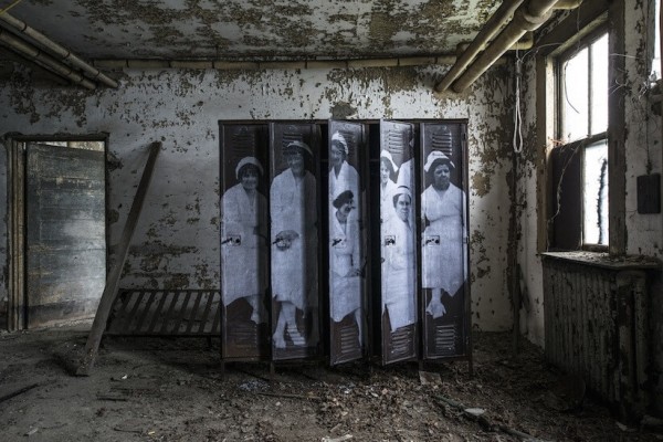 UNFRAMED Photo Exhibition in the abandoned Ellis Island Hospital by street artist JR 5