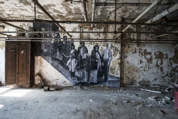 UNFRAMED Photo Exhibition in the abandoned Ellis Island Hospital by street artist JR 6