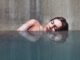 Hyper-realistic bathing ladies by surfer Hula