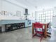Studio Appelo converts an industrial garage space in Amsterdam into a family home