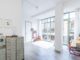Studio Appelo converts an industrial garage space in Amsterdam into a family home