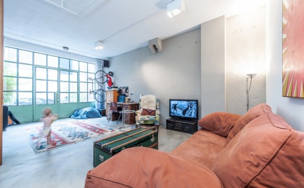 Studio Appelo converts an industrial garage space in Amsterdam into a family home
